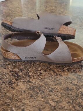 Birkenstock Kids Two-Strap Sandals in Taupe with Copper Buckles